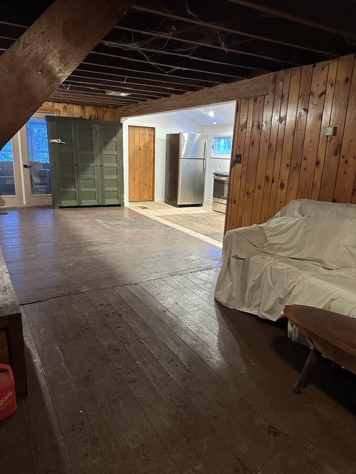 Finished basement with recessed lighting and luxury vinyl flooring in Dallas PA.