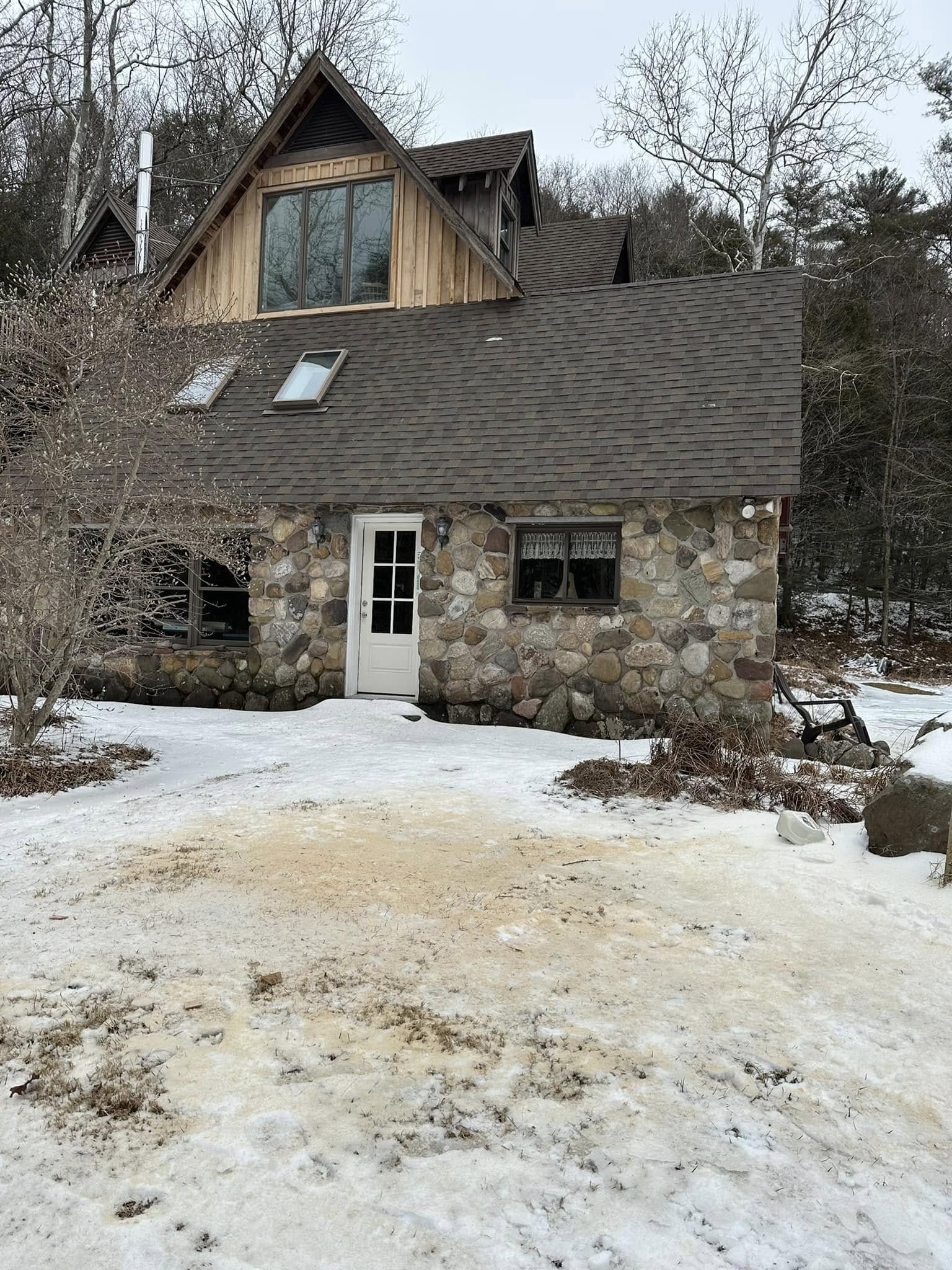 Completed whole house remodel with updated exterior and stone facade in Dallas PA.